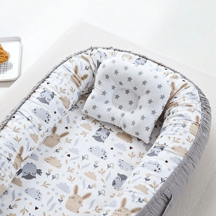 reducteur-de-lit-bebe-chouette-lapin-coussin-tete