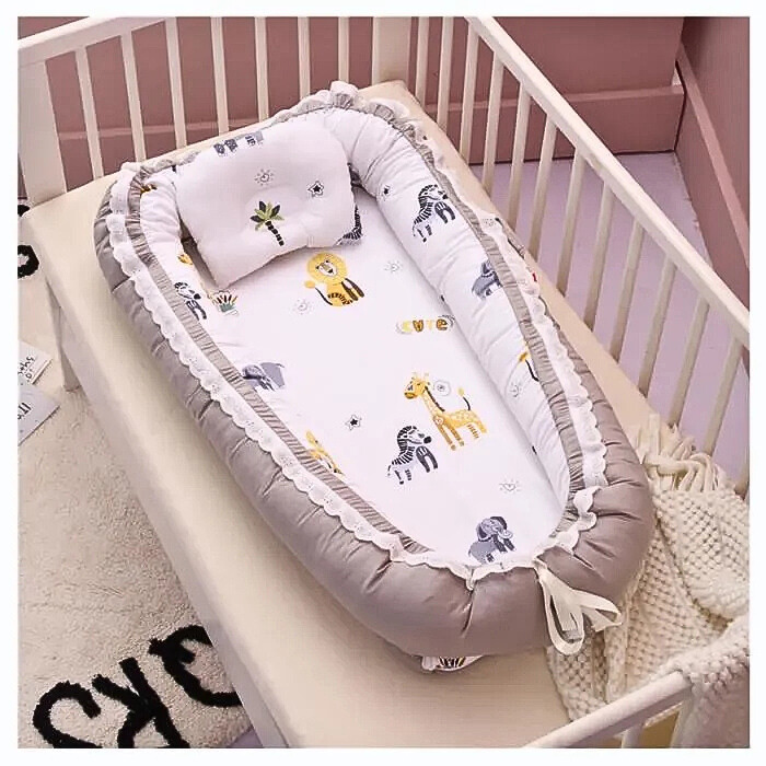 reducteur-de-lit-bebe-savane-rassurant-reconfortant