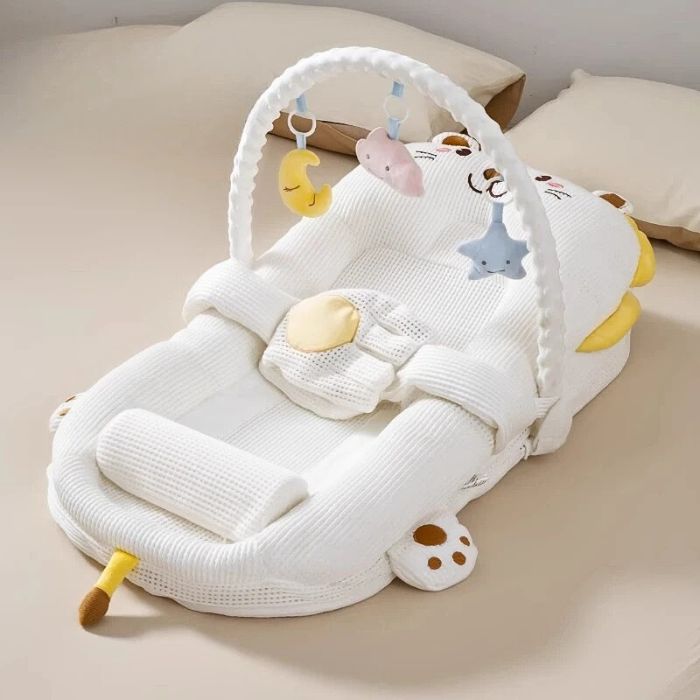 reducteur de lit bebe avec inclinaison