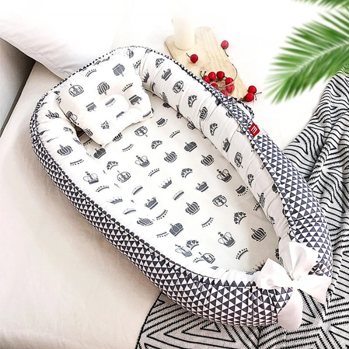 reduteur-de-lit-bebe-couronne-sommeil-de-qualite