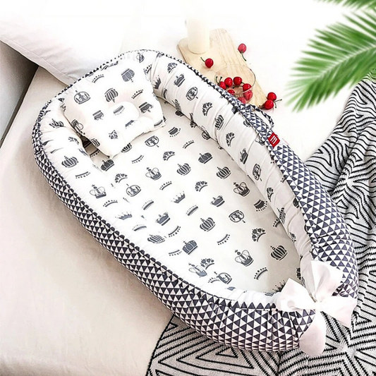 reduteur-de-lit-bebe-couronne-sommeil-de-qualite