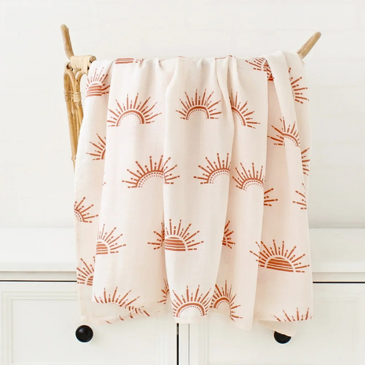 couverture motif soleil en gaze de coton couleur beige