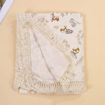 couverture-bebe-motifs-foret-avec-franges