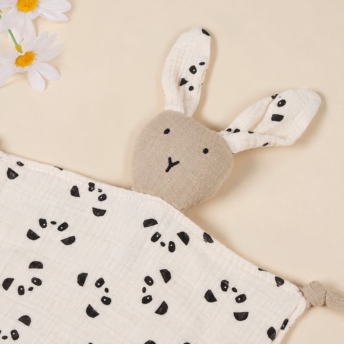 doudou lapin douce tendresse aux motifs panda beige