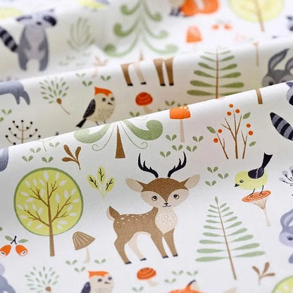 drap housse lit bébé forêt et océan motifs forêt
