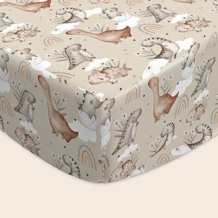 drap housse lit bebe dino motifs dinosaures et arc-en-ciel et bords elastiques
