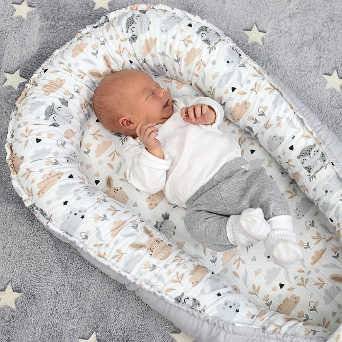 reducteur-de-lit-bebe-chouette-lapin-bebe-en-securite
