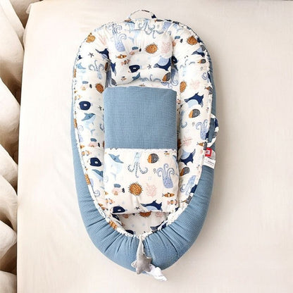 reducteur-de-lit-bebe-cocon-marin-avec-couette-couleur-bleu