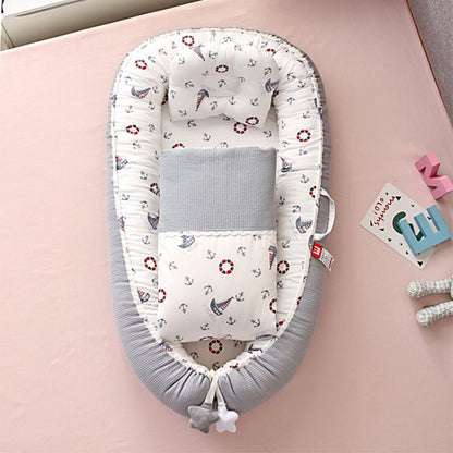 reducteur-de-lit-bebe-cocon-marin-avec-couette_gris