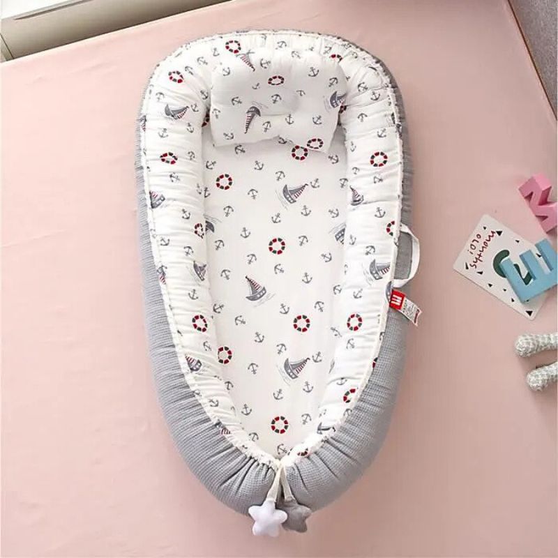 reducteur-de-lit-bebe-cocon-marin-gris