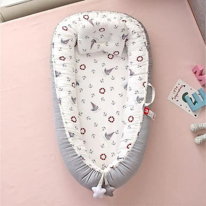 reducteur-de-lit-bebe-cocon-marin-gris