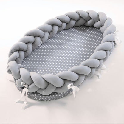 reducteur_de_lit_bebe_tresse_gris